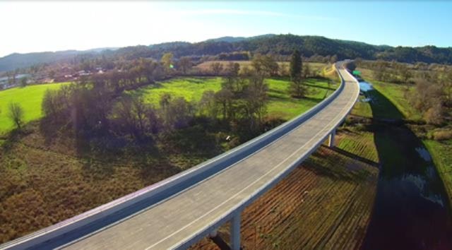 May contain: road, freeway, highway, nature, and outdoors