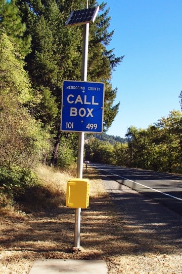 highway, emergency call box. pole, sign, solar panel