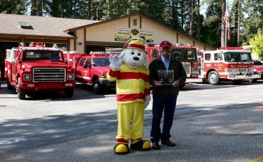May contain: human, person, truck, vehicle, transportation, and fire truck