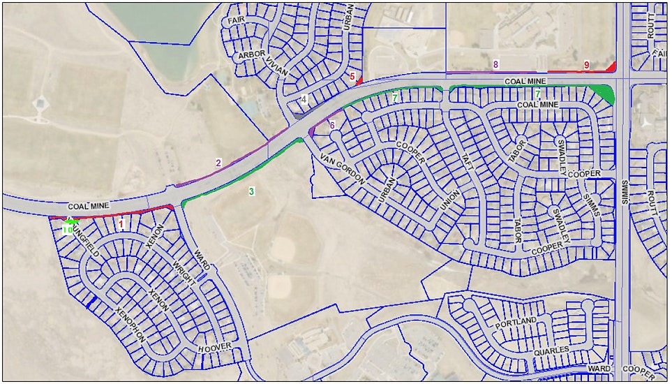 A map with street layouts, labeled roads, and color-coded lines, possibly indicating routes or zones.