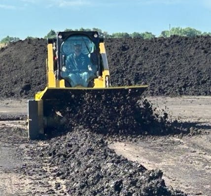 Drying Our Processed Solids with a Skid Steer and Auger Aerator