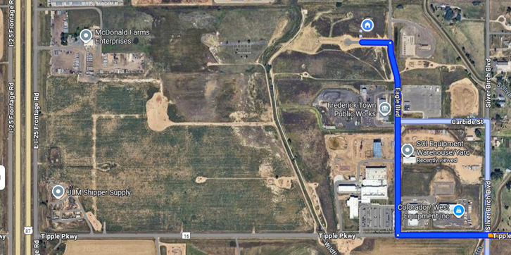 Aerial view of an industrial area with marked locations and a route. Notable spots include McDonald Farms, JJM Shipper Supply, and a warehouse.