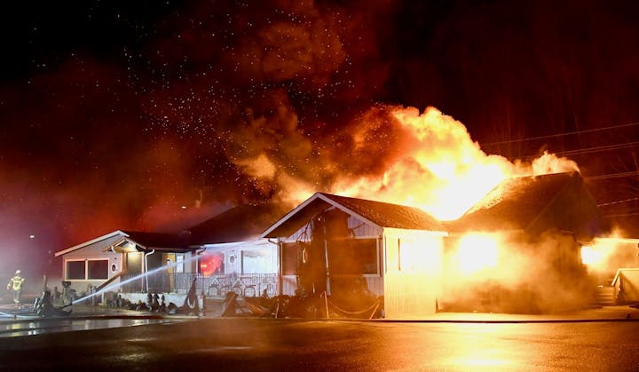 May contain: person and fire