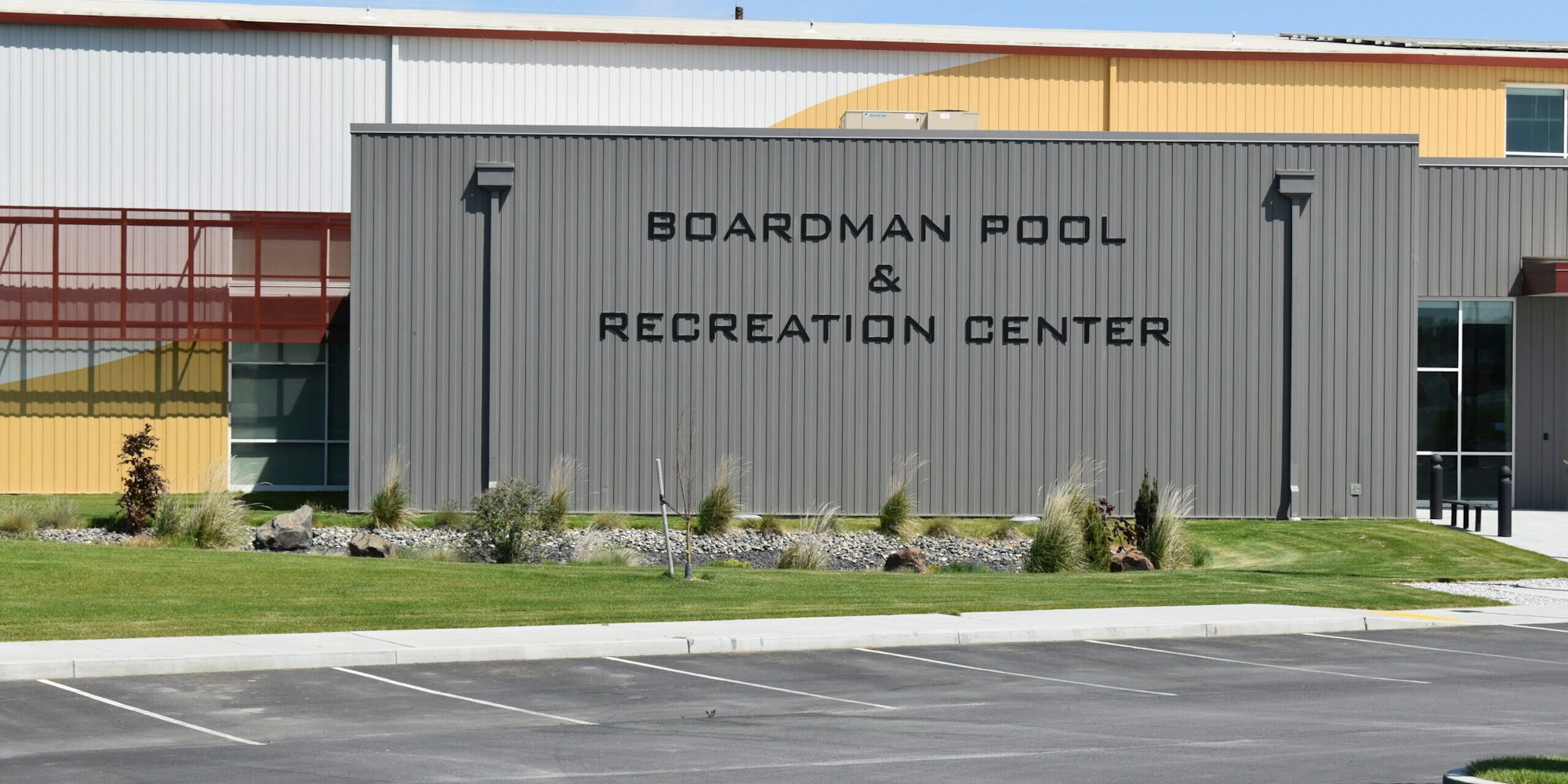 Exterior of Boardman Pool & Recreation Center with parking lot and landscaping.