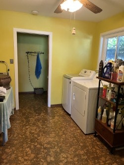 Laundry room with washer, dryer, shelving with detergent, and a hanging blue towel. Bright yellow walls and a brown patterned floor.