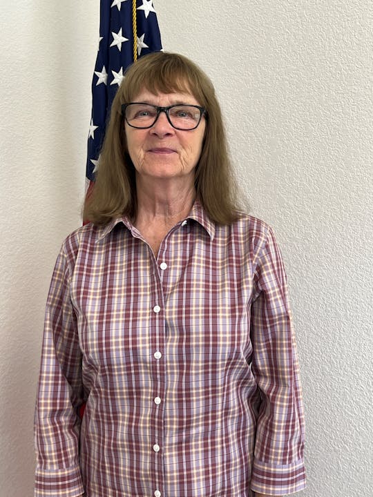 May contain: clothing, shirt, face, head, person, photography, portrait, long sleeve, sleeve, accessories, glasses, and blouse