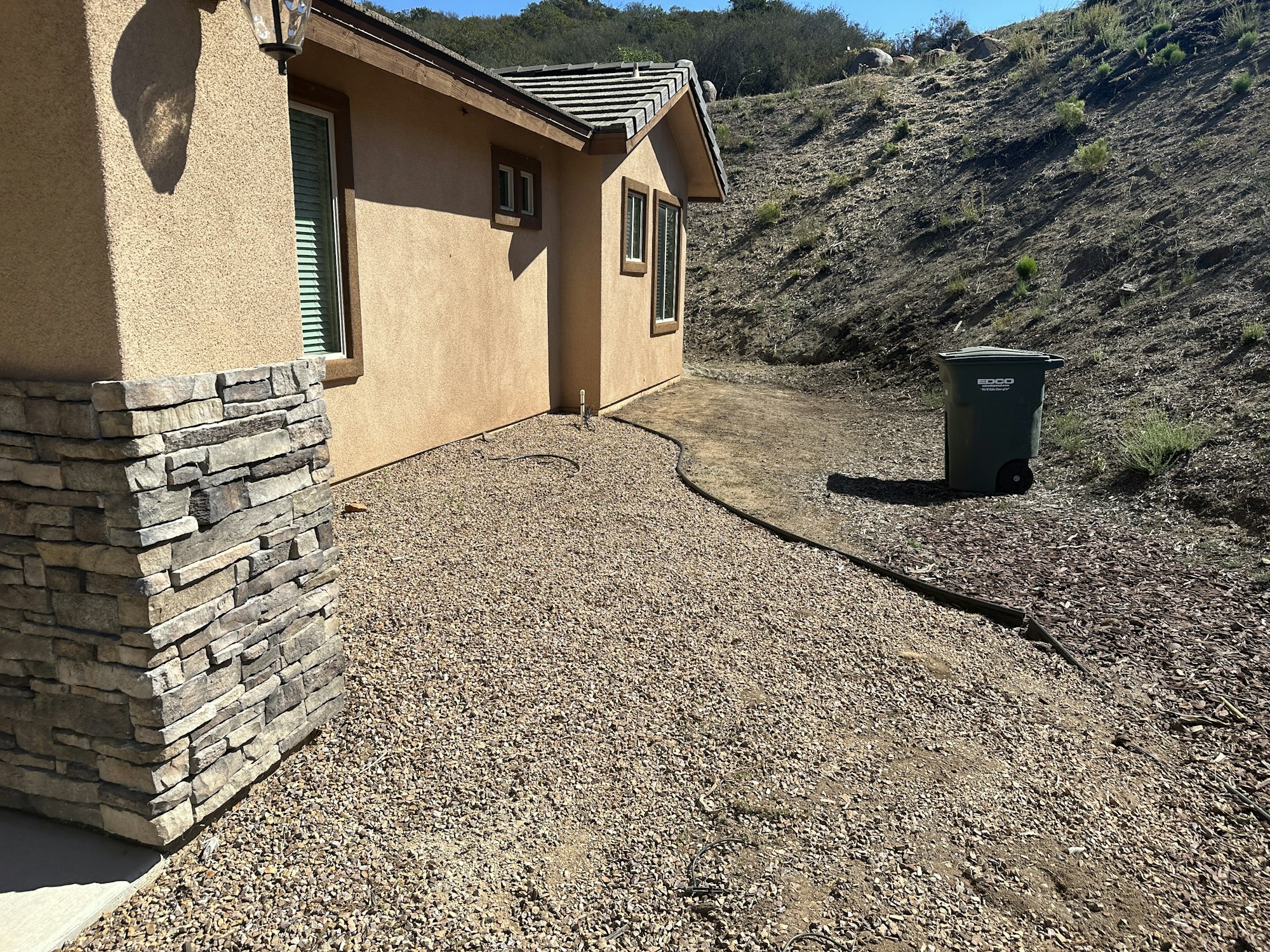 Zone 0 immediate area around the exterior NO combustible materials.