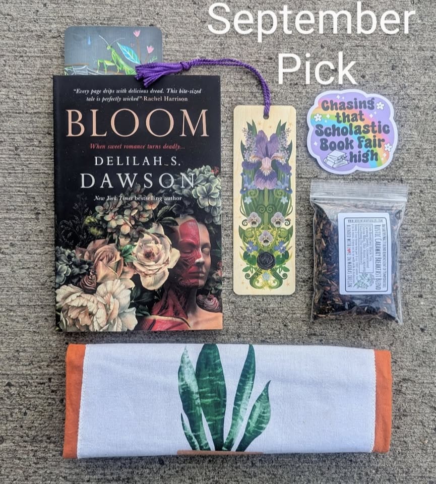 Book titled "Bloom," bookmark, sticker, tea packet, and a fabric item with a plant design, labeled "September Pick."
