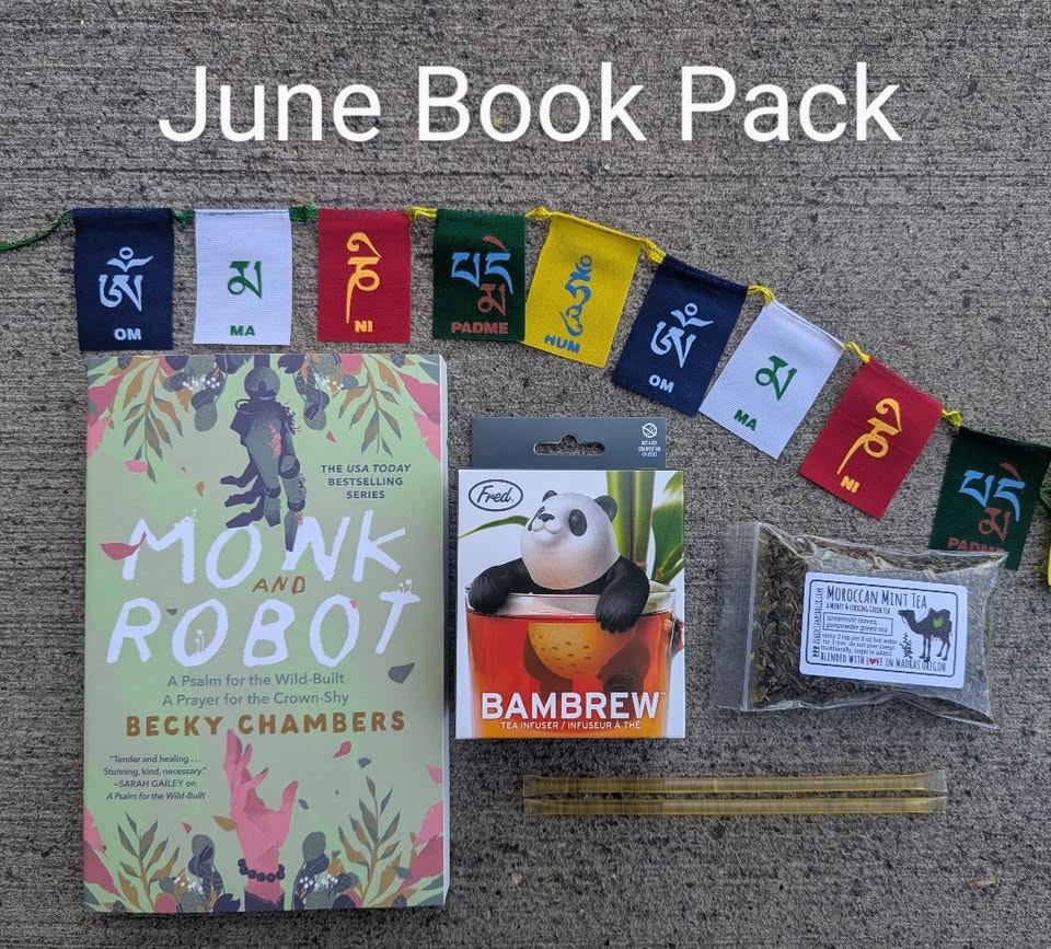 June Book Pack: includes "Monk and Robot" book, a panda tea infuser, Moroccan mint tea, and colorful prayer flags.