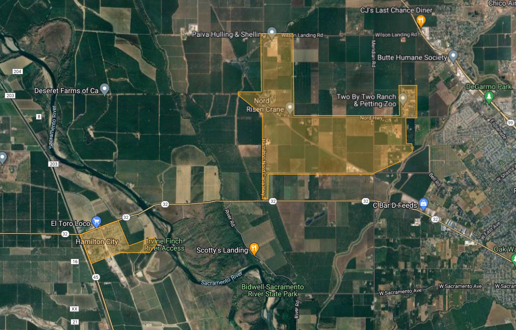 Aerial map view showing farmland, roads, a river, and various business markers near Hamilton City and Chico, California.