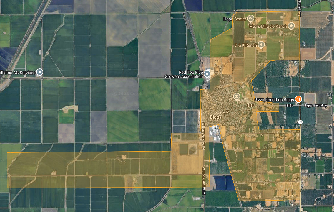 Aerial view of agricultural fields and the town of Biggs, with various labeled landmarks and roads.