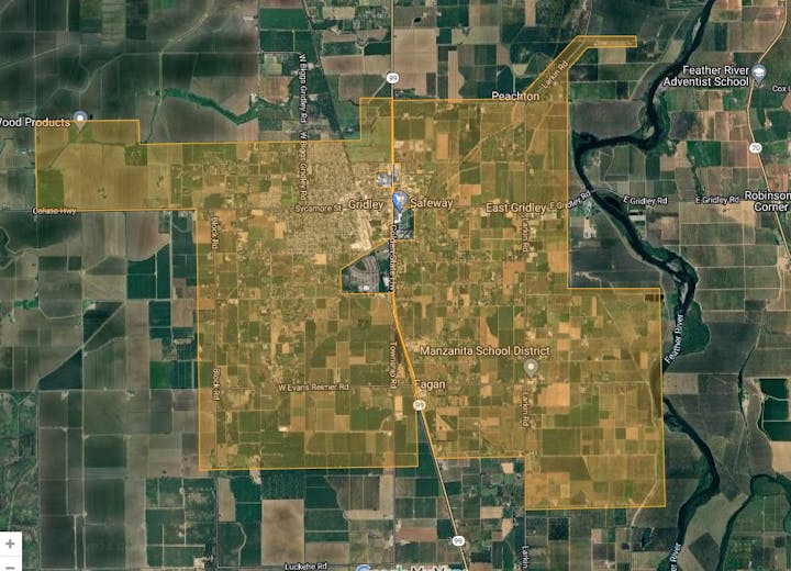 Aerial map view of a gridded landscape with fields, roads, and a river, indicating a rural area, possibly for agriculture.