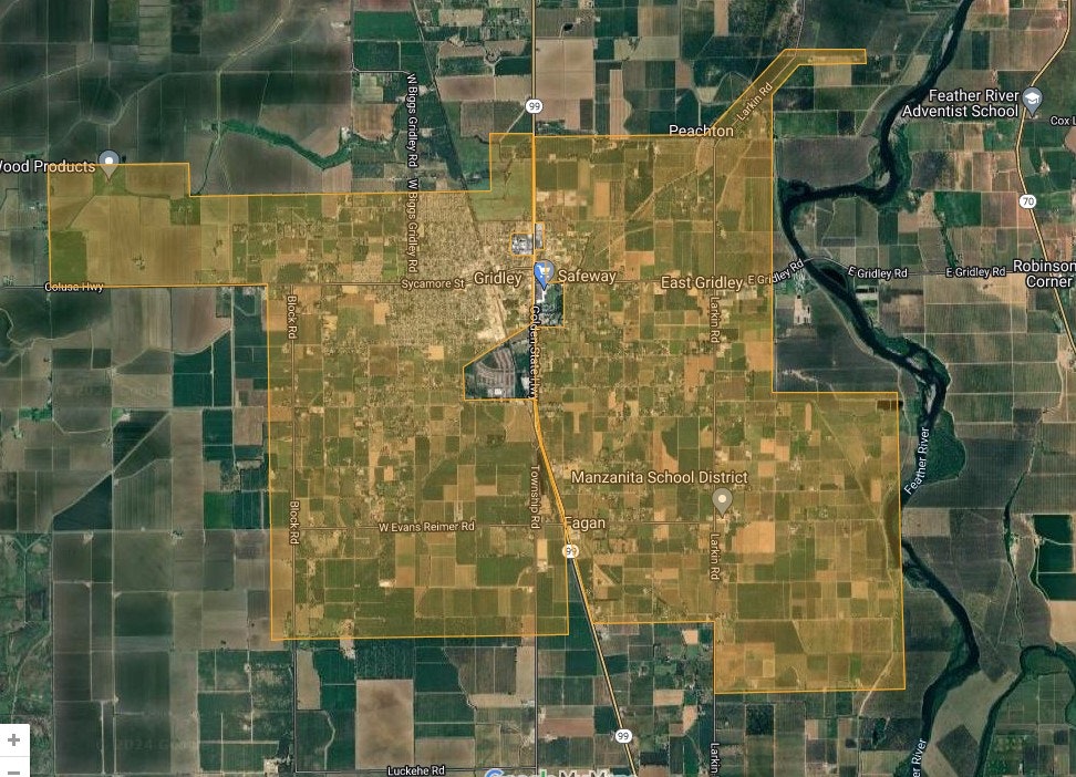 Aerial map view of a gridded landscape with fields, roads, and a river, indicating a rural area, possibly for agriculture.