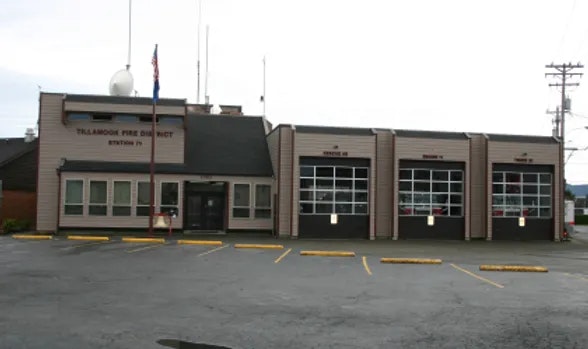 large firehouse with three garage doors