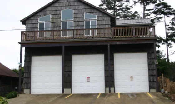 fire station with three large garage doors