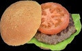 A hamburger with a beef patty, lettuce, and tomato slice on a bun.