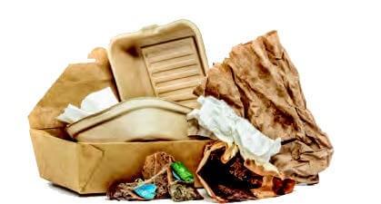 A pile of crumpled and used food packaging, including containers and wrappers, likely intended for recycling or waste.