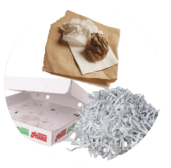 A crumpled brown paper, napkin, empty pizza box, and shredded paper.