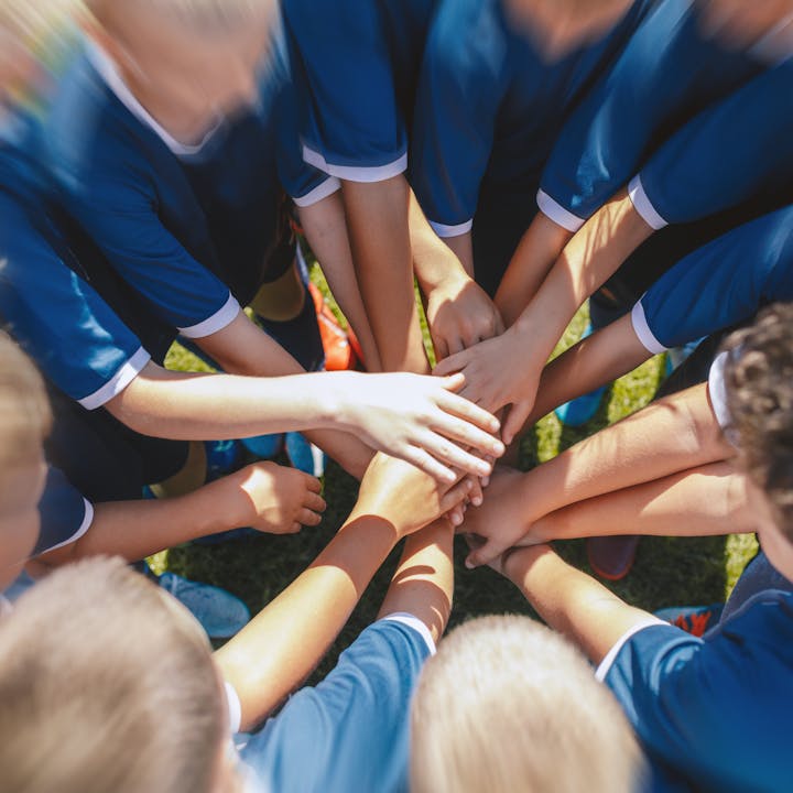 May contain: people, person, crowd, huddle, clothing, footwear, and shoe