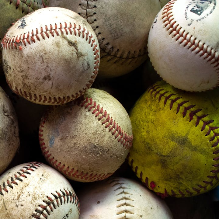 May contain: sphere, ball, baseball, baseball (ball), sport, baseball glove, clothing, and glove