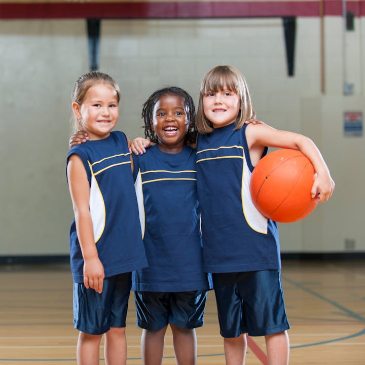 May contain: people, person, ball, basketball, basketball (ball), sport, football, soccer, soccer ball, sphere, clothing, shorts, and playing basketball