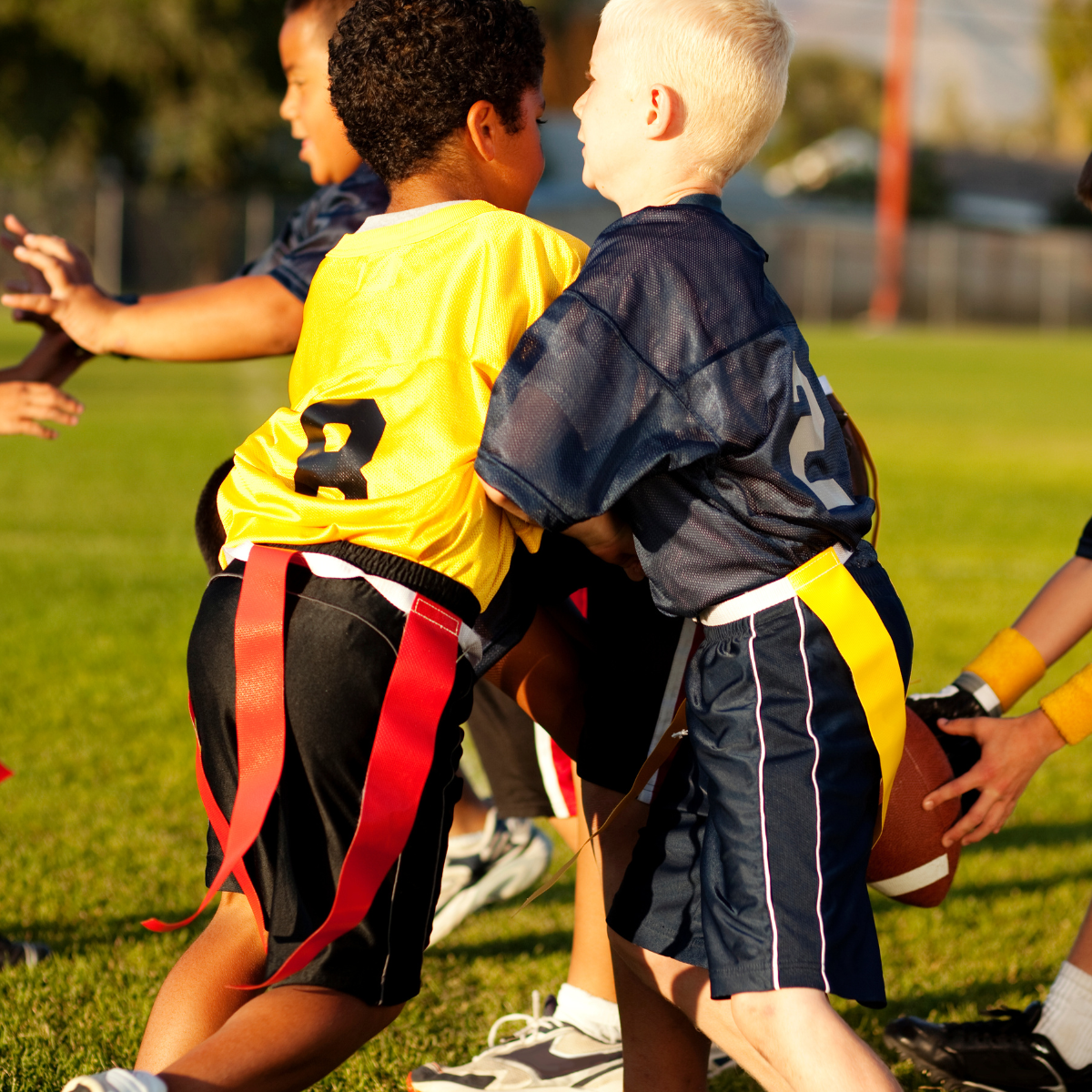 Children playing flag football.
