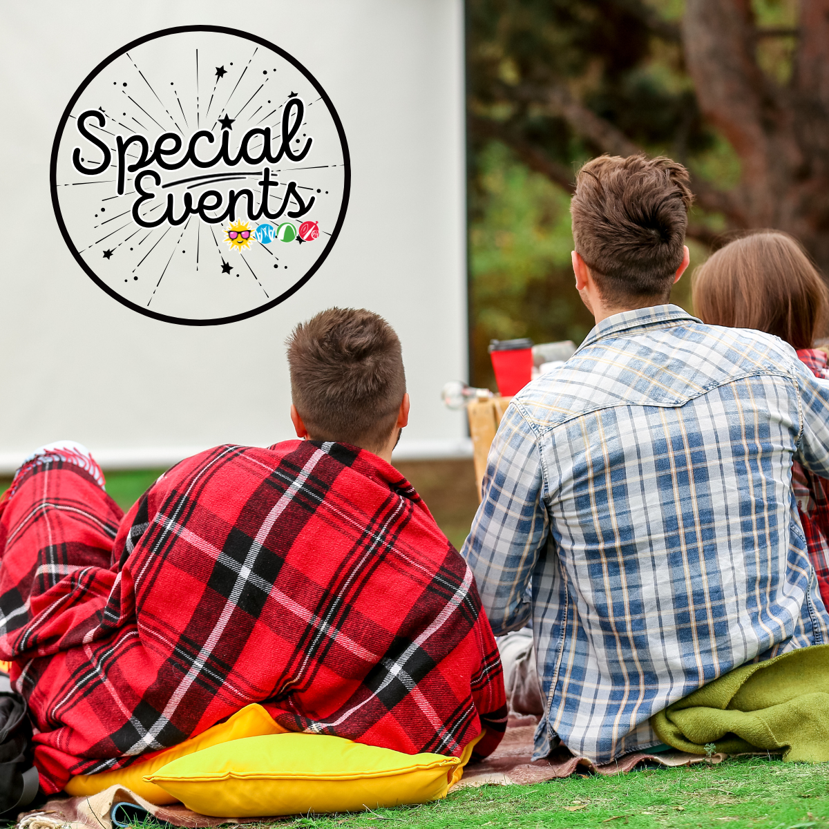People sitting outside in blankets, watching a screen with "Special Events" text.