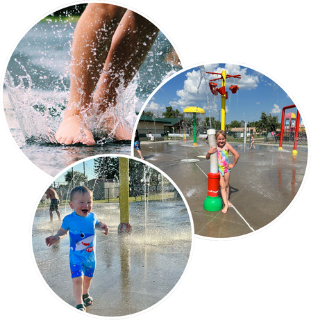 Children playing and splashing in a water park on a sunny day.