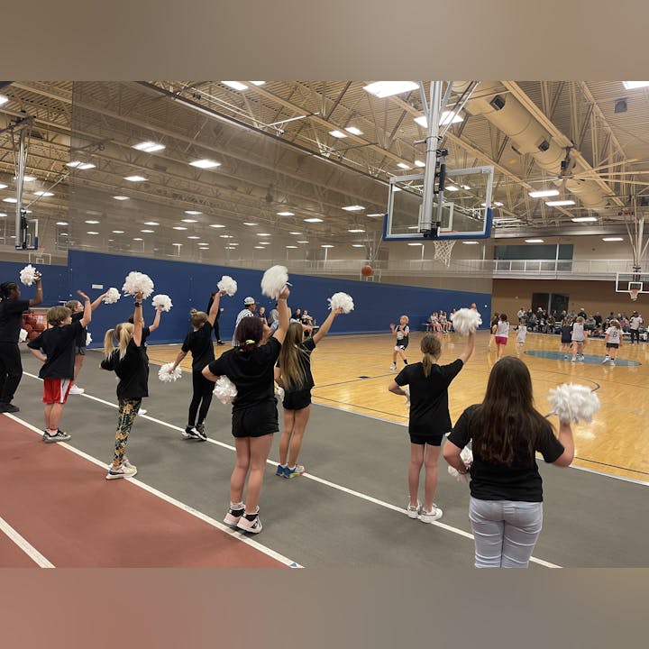 May contain: person, adult, female, woman, clothing, footwear, shoe, ball, basketball, basketball (ball), sport, hat, accessories, bag, handbag, and cheerleading