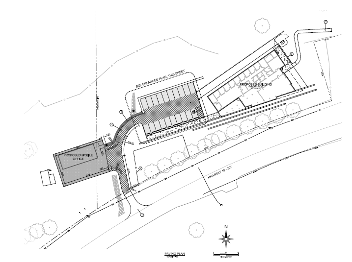 Site plan with proposed building, parking, mobile office, and landscaping layout, including pathways and a north compass.