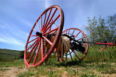 May contain: machine, wheel, and spoke