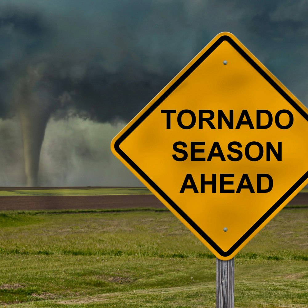 May contain: outdoors, nature, sign, symbol, road sign, storm, and tornado
