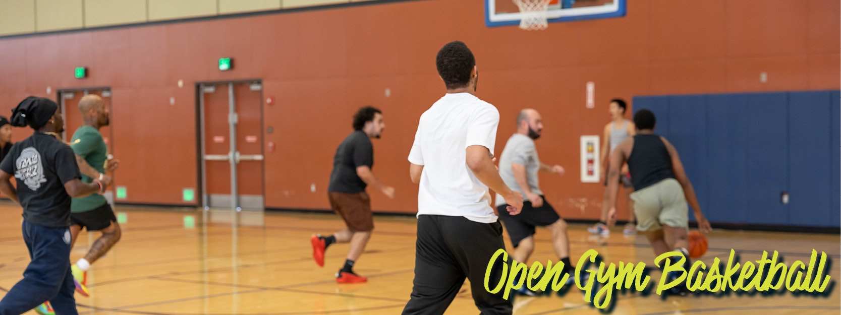 Men playing basketball in an indoor gym with the text "Open Gym Basketball."