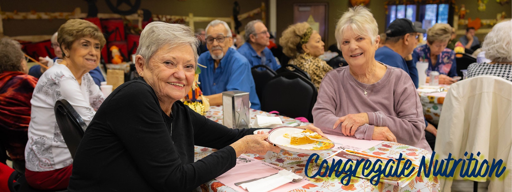 Group of seniors dining together, smiling, with "Congregate Nutrition" text overlay.