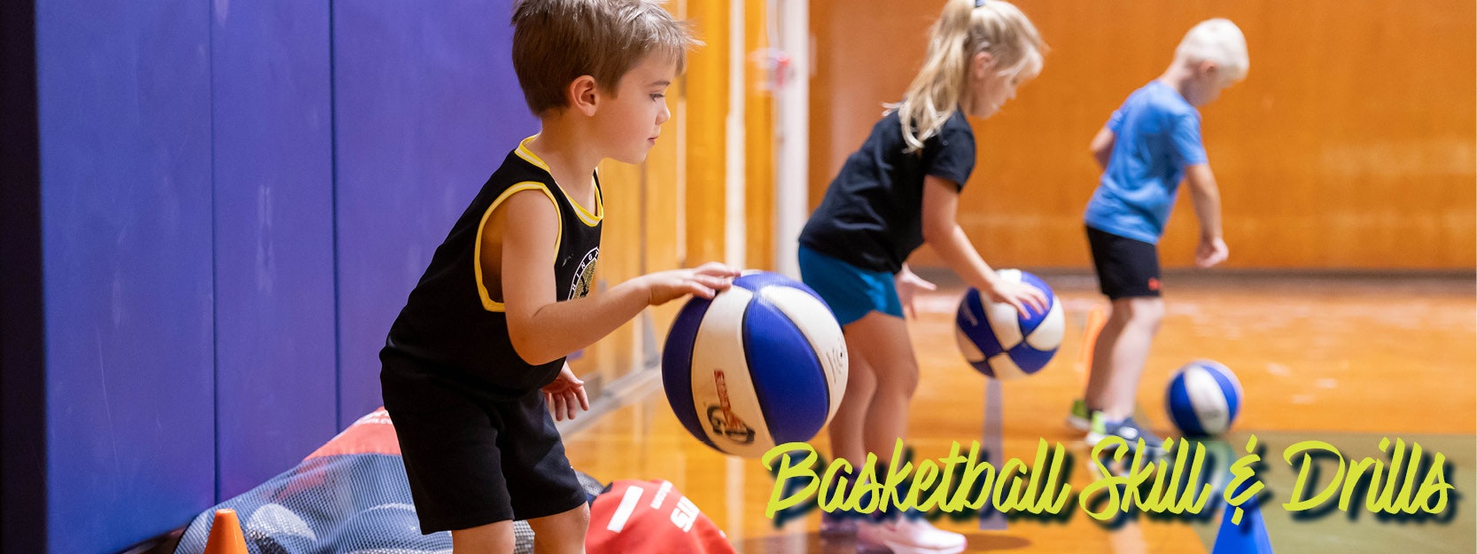 Children practicing basketball skills in a gym, with the text "Basketball Skill & Drills."