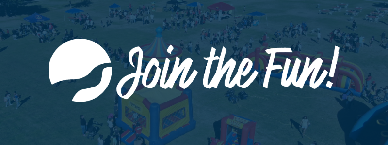 A promotional banner with the slogan "Join the Fun!" over a blurred background depicting an outdoor event with crowds and inflatables.