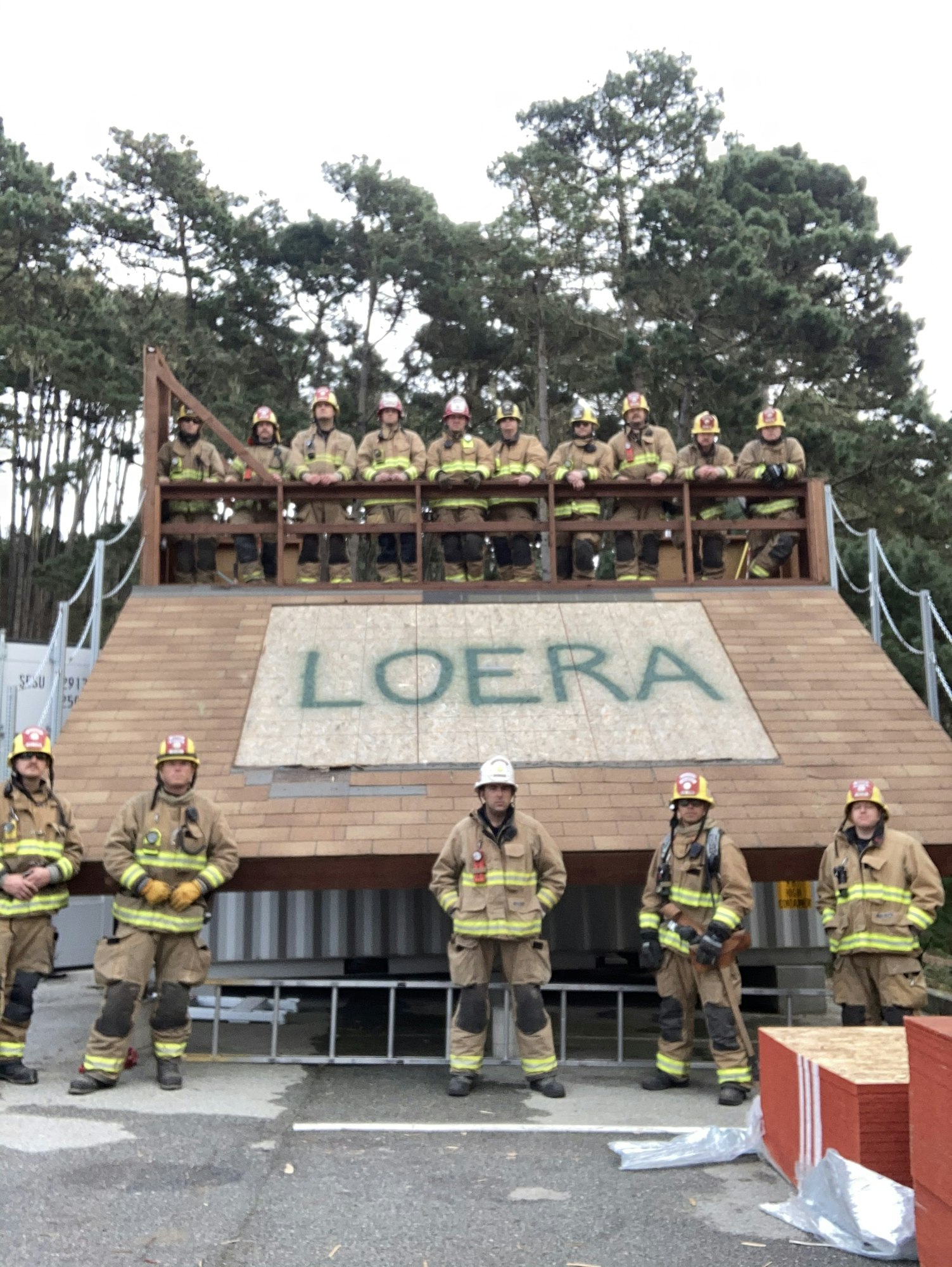 May contain: fireman, person, human, shoe, clothing, footwear, and apparel