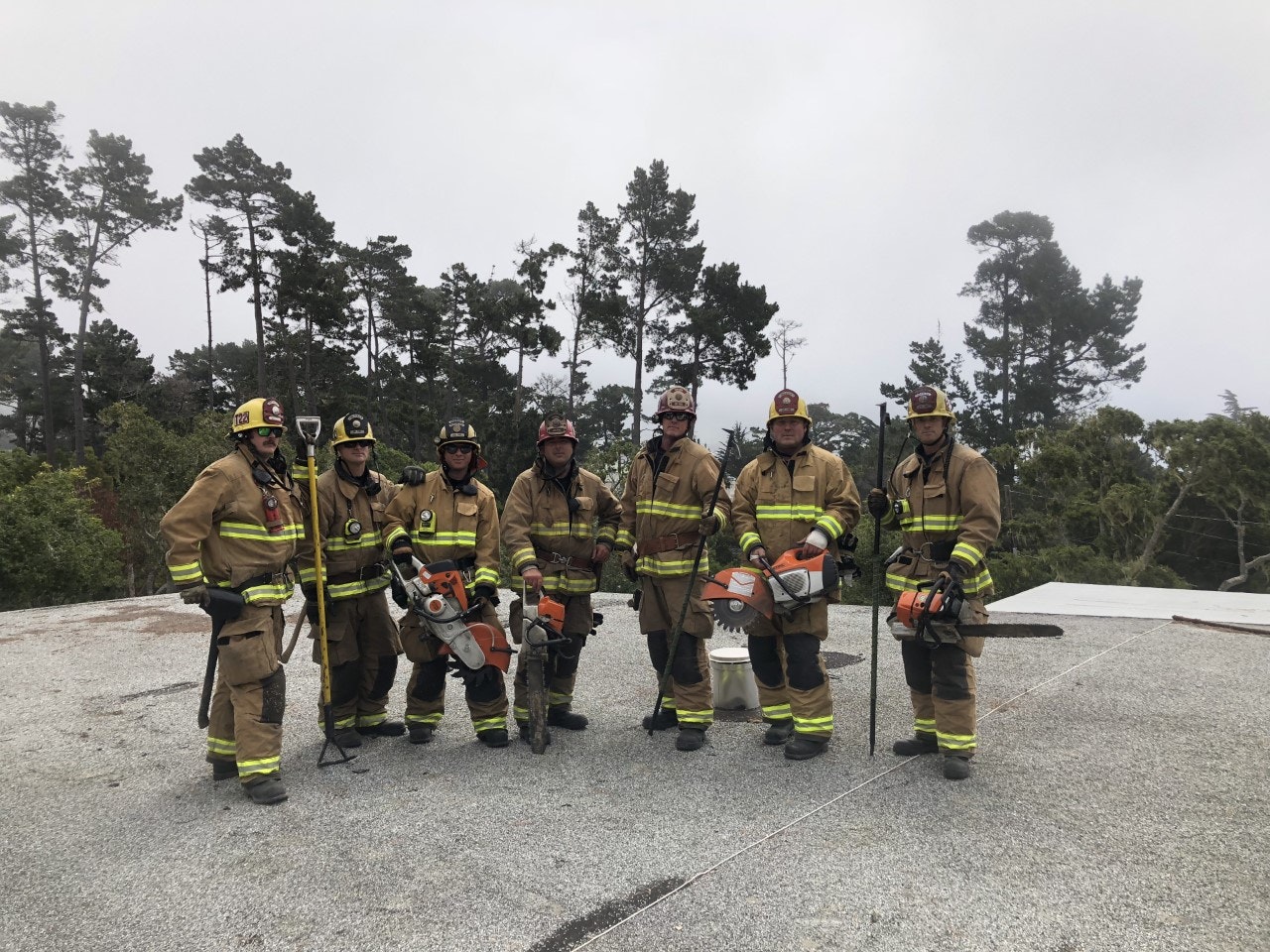 May contain: person, human, fireman, helmet, clothing, and apparel