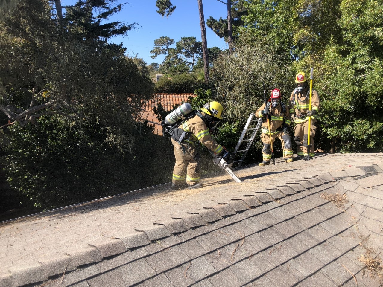 May contain: person, human, helmet, clothing, apparel, and fireman