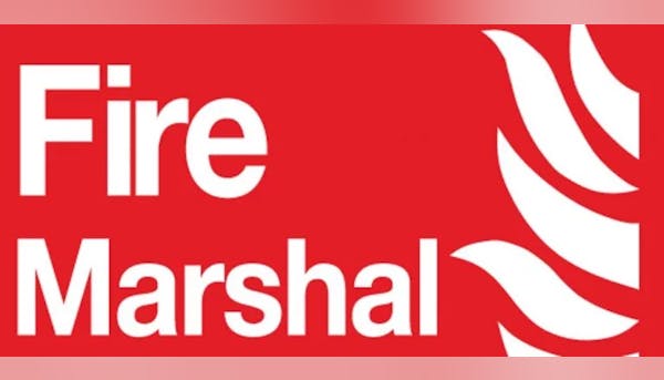 Red sign with "Fire Marshal" text and a flame graphic.