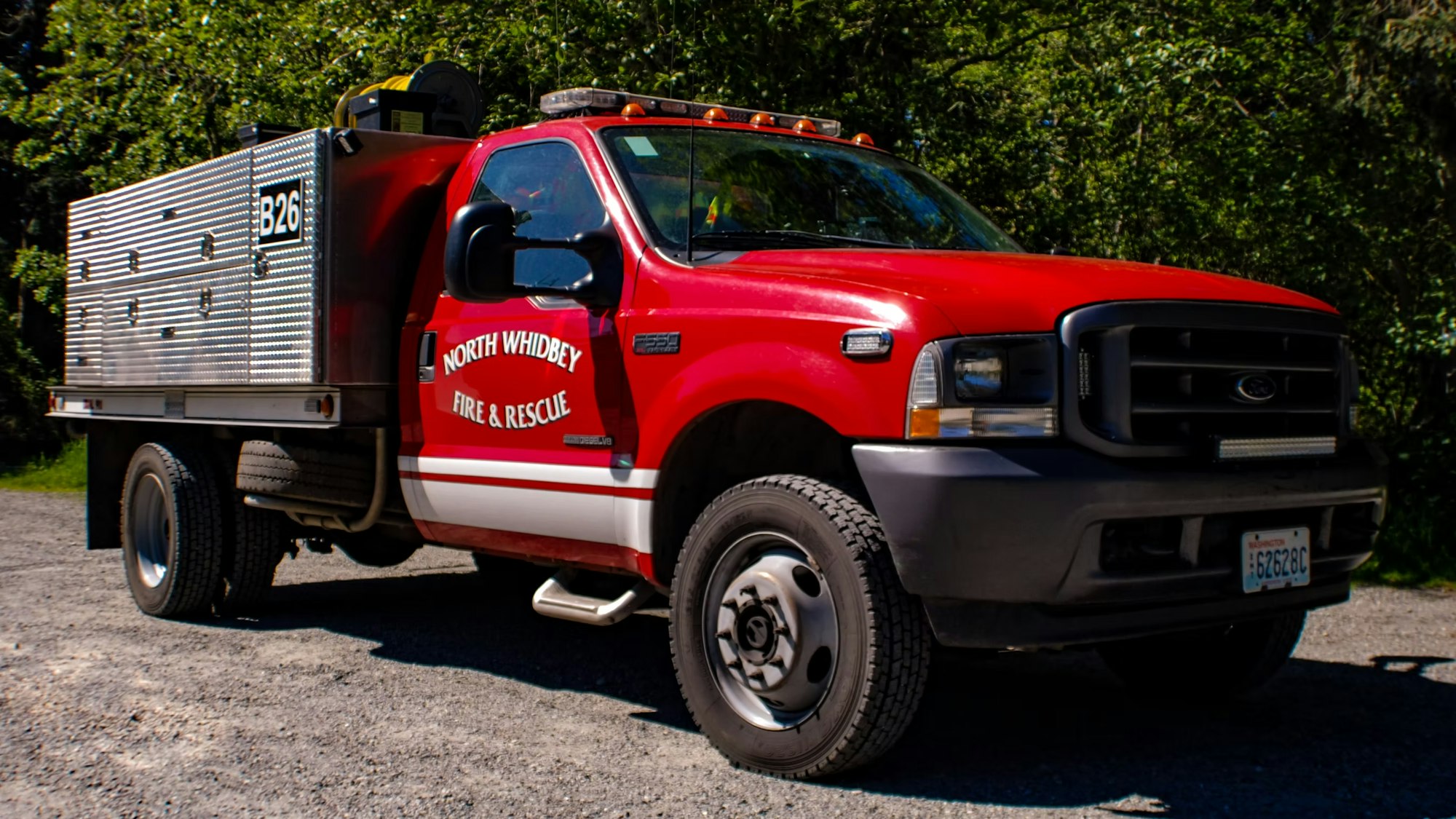 A red North Whidbey Fire & Rescue truck is parked outdoors.