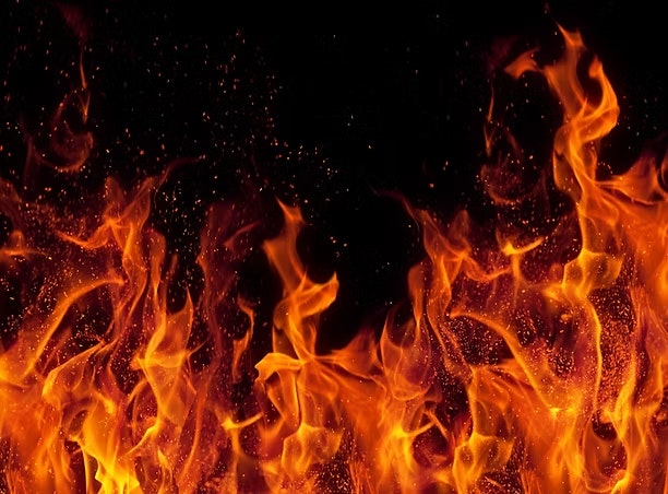 Bright orange flames against a dark background.