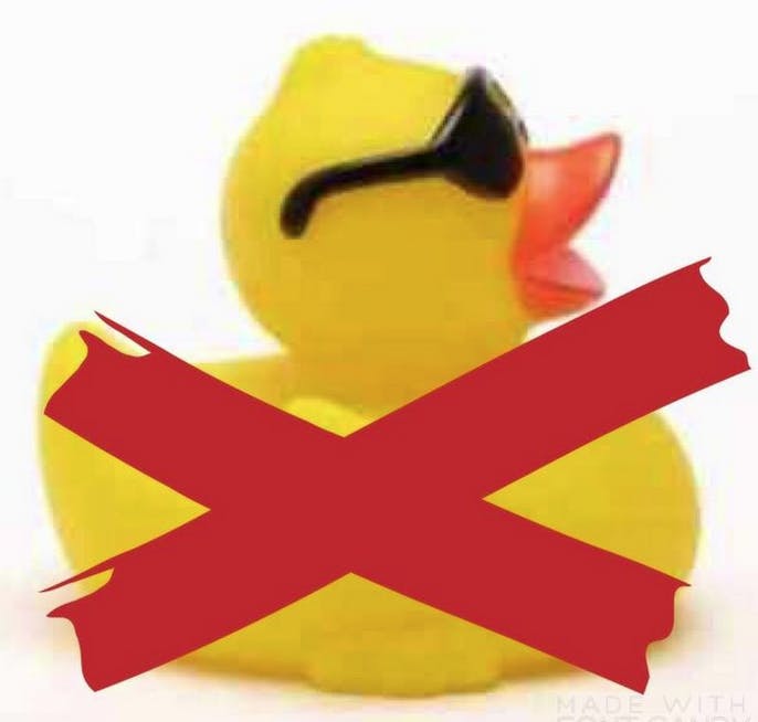 rubber duck with an x across it