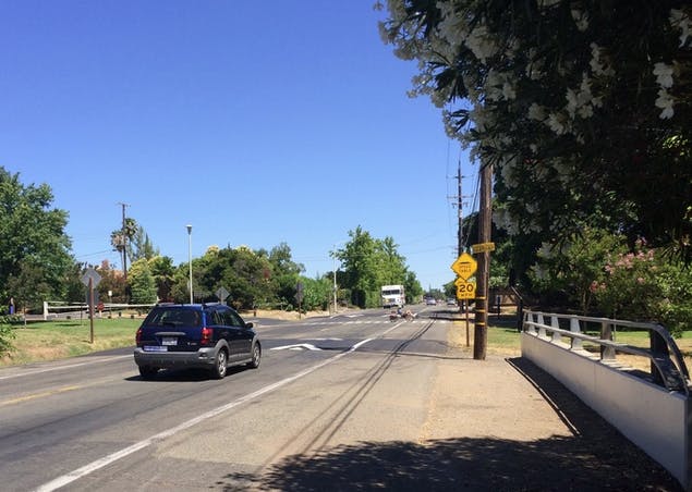 May contain: road, transportation, car, vehicle, automobile, freeway, and highway