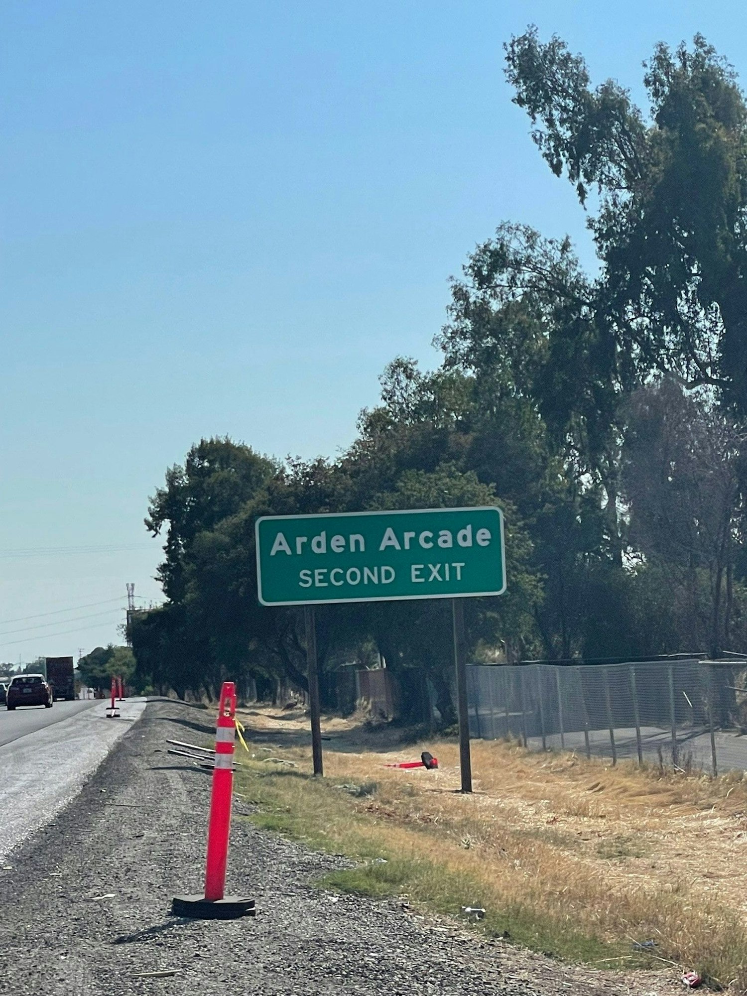 May contain: road, symbol, car, transportation, vehicle, and automobile