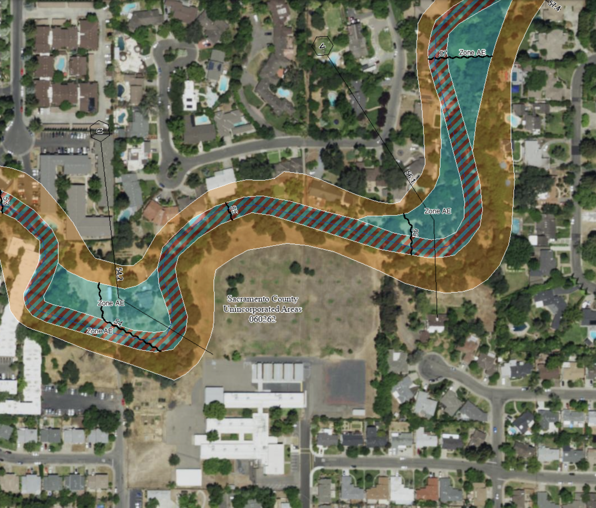 May contain: landscape, nature, outdoors, scenery, dinosaur, animal, reptile, aerial view, neighborhood, building, and urban