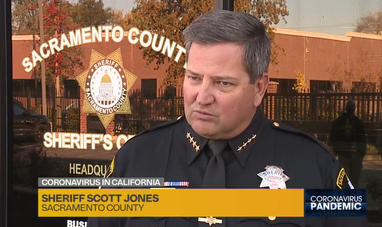 May contain: human, person, military, military uniform, officer, transportation, automobile, vehicle, and car