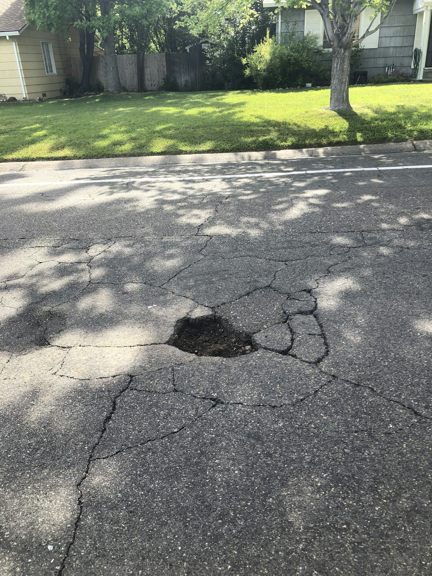 photo of deep pothole