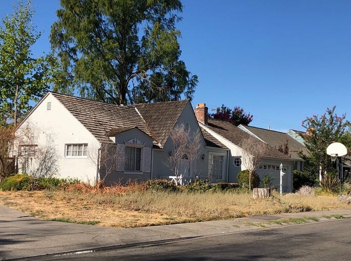 May contain: neighborhood, urban, building, suburb, and housing