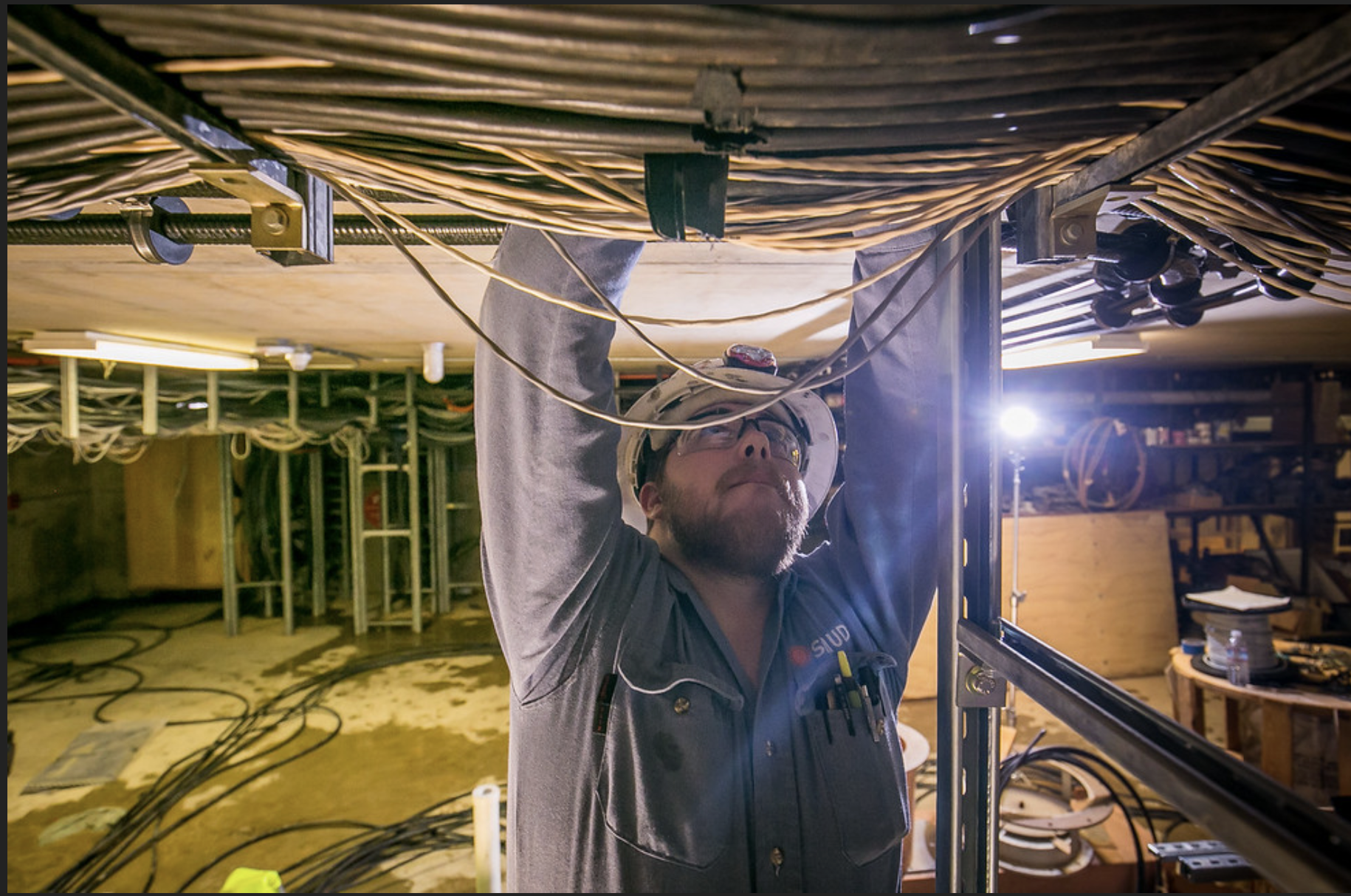 May contain: lighting, adult, male, man, person, worker, face, head, and indoors